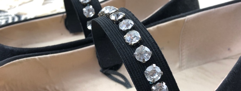 close up of jewels on elastic fixed to shoes